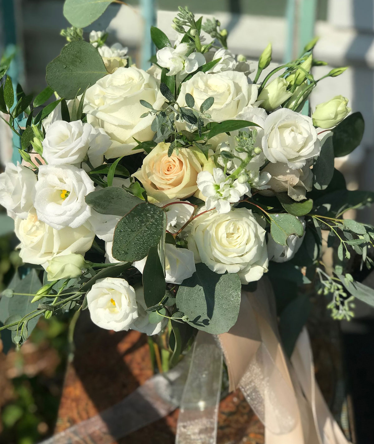 Bridal bouquet, white flowers with silvery green eucalyptus