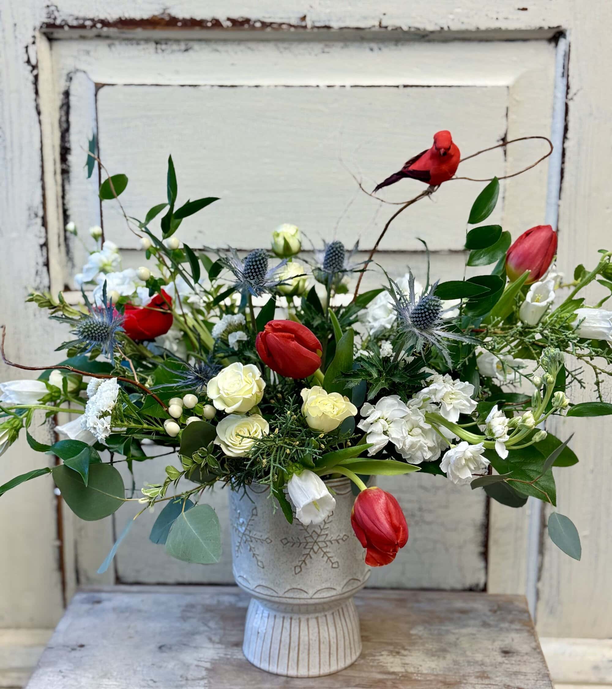 A bright arrangement in red and white from Art in Bloom Floral Studio in Howell, Michigan.